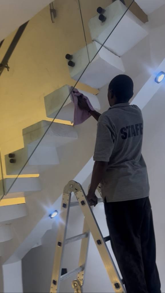 Spotless Care cleaning team at work on a job site in Abuja
