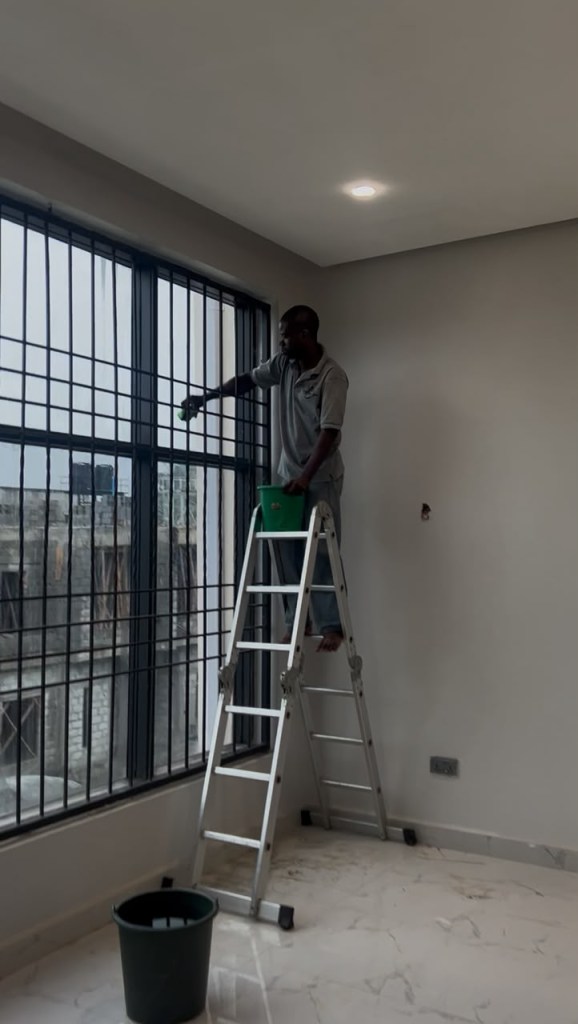 Spotless Care staff in uniform on a cleaning job in Abuja