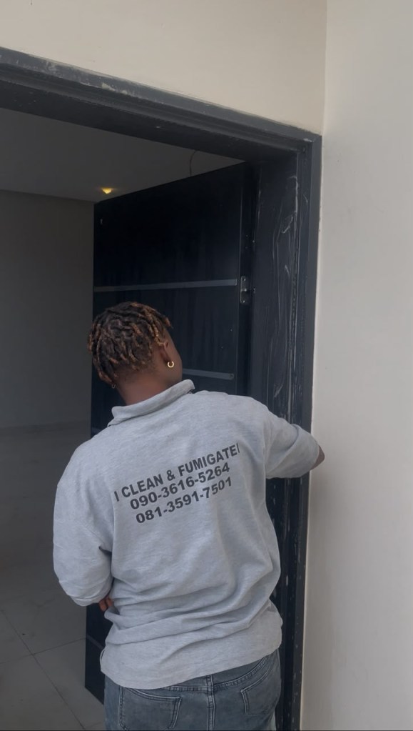 Spotless Care staff in company uniform on a cleaning job