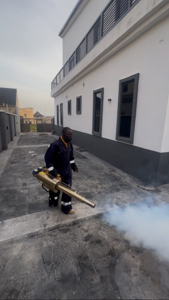 Spotless Care technician carrying out a fumigation treatment in Abuja