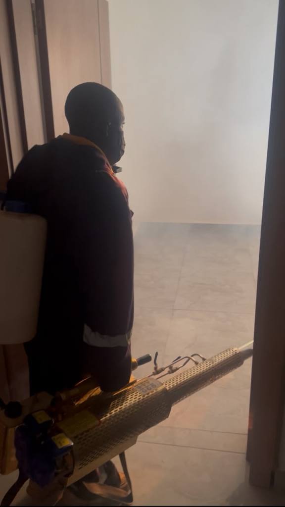 Pest control treatment in progress at a client site in Abuja